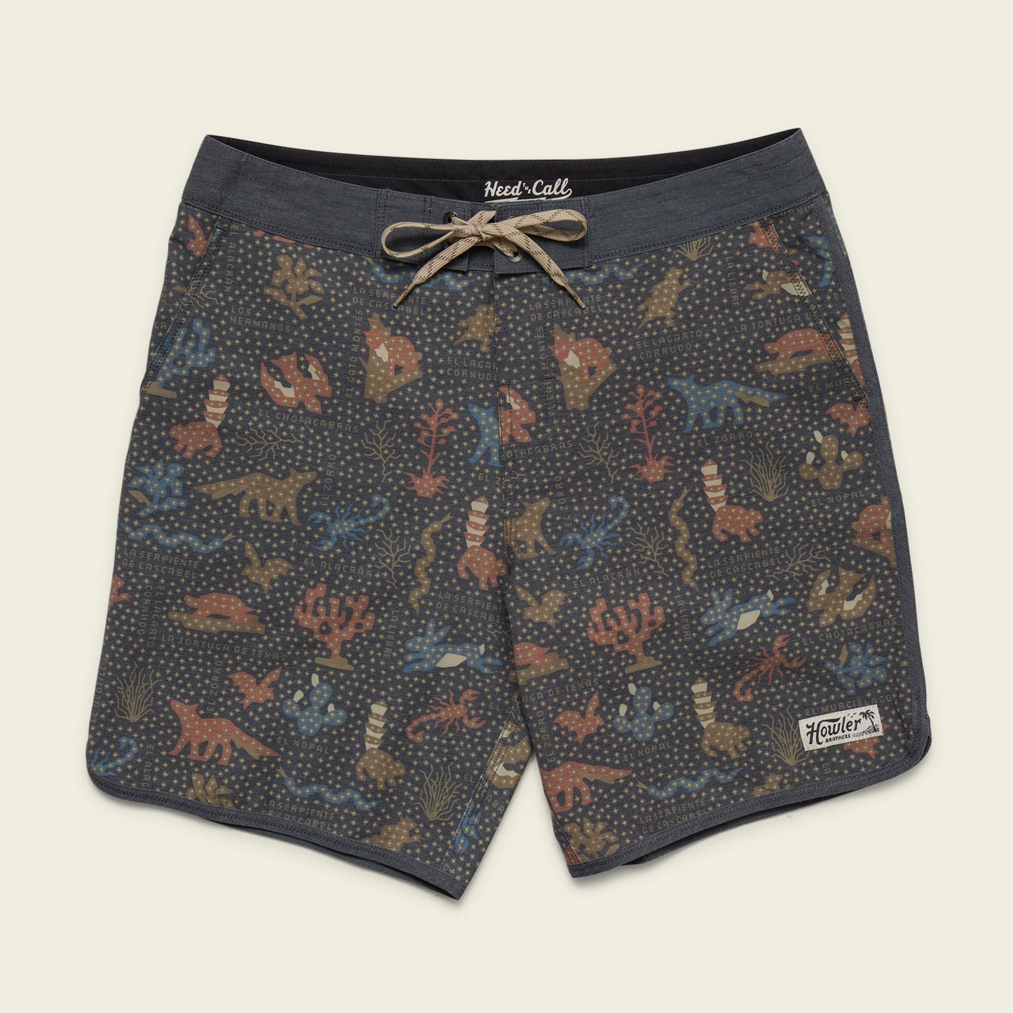 Patterned Bruja Boardshorts with a drawstring waist, featuring colorful dinosaurs and plants on a dark background with scattered dots. Stretchy fabric and draining front pockets add comfort and function. A Howler Bros patch is sewn near the bottom hem. - View 1